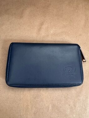 Herschel Supply Company Navy Blue Leather Zip Around Wallet. 6” by 3.5” by 1”